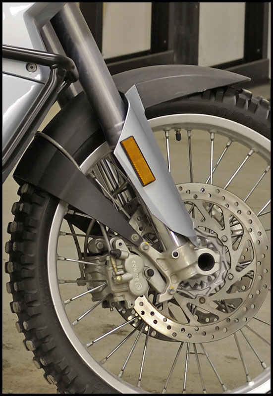 Brake line over fender