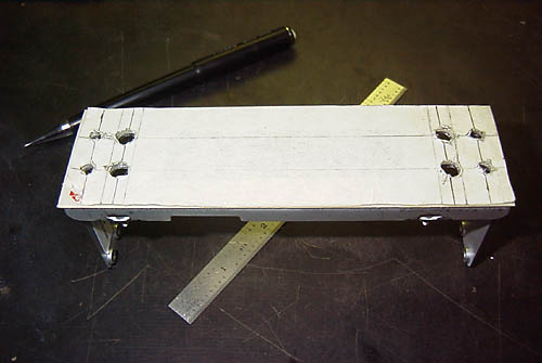 Drilled bracket