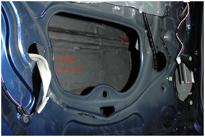 Soundproofing installed on outer door skin