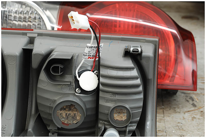 Strobe tube mounted in tail light assembly